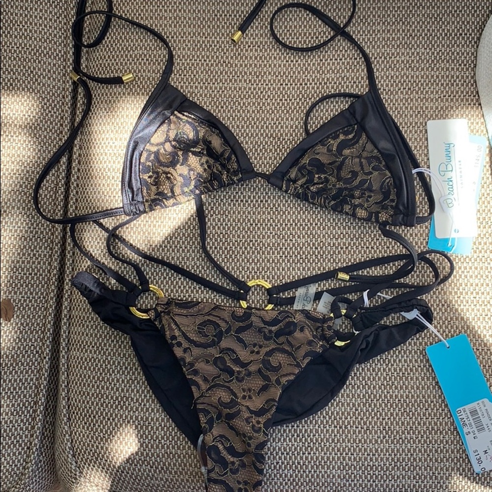 Never worn with tags baiting suit